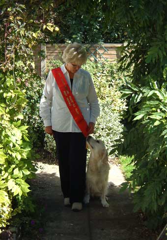 Liz showing Evie's sash